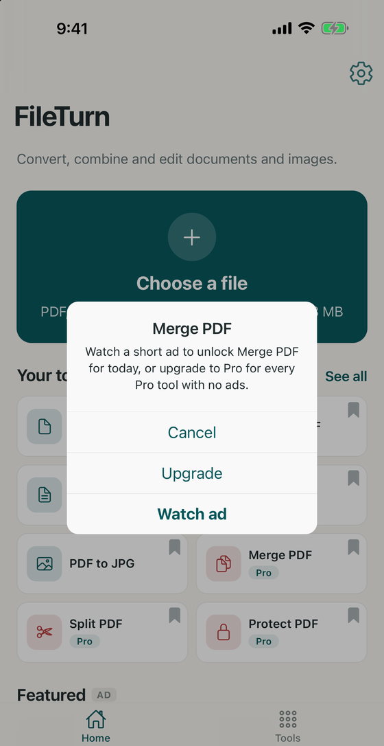 FileTurn asking whether to watch an ad to unlock Merge PDF for today or upgrade to Pro